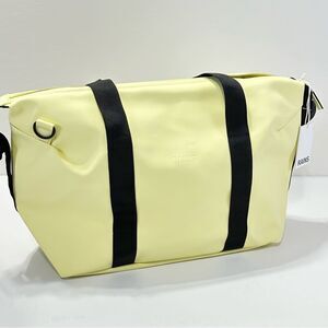Rains Hilo Weekend Duffle in Acid Yellow Black Trim Top Handle Overnight Travel